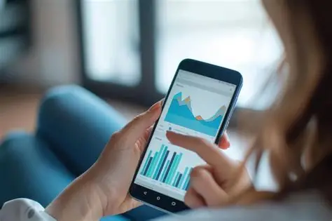 A person holding a smartphone displaying financial charts